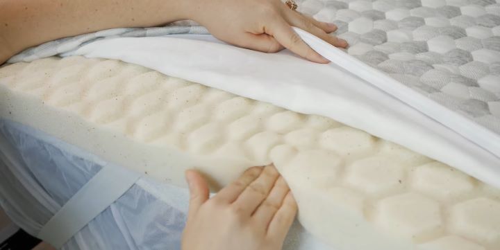 Checking out the softness and durability of the mattress topper